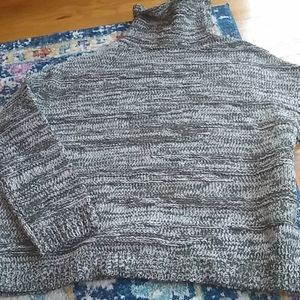 Cowl neck knitted sweater.